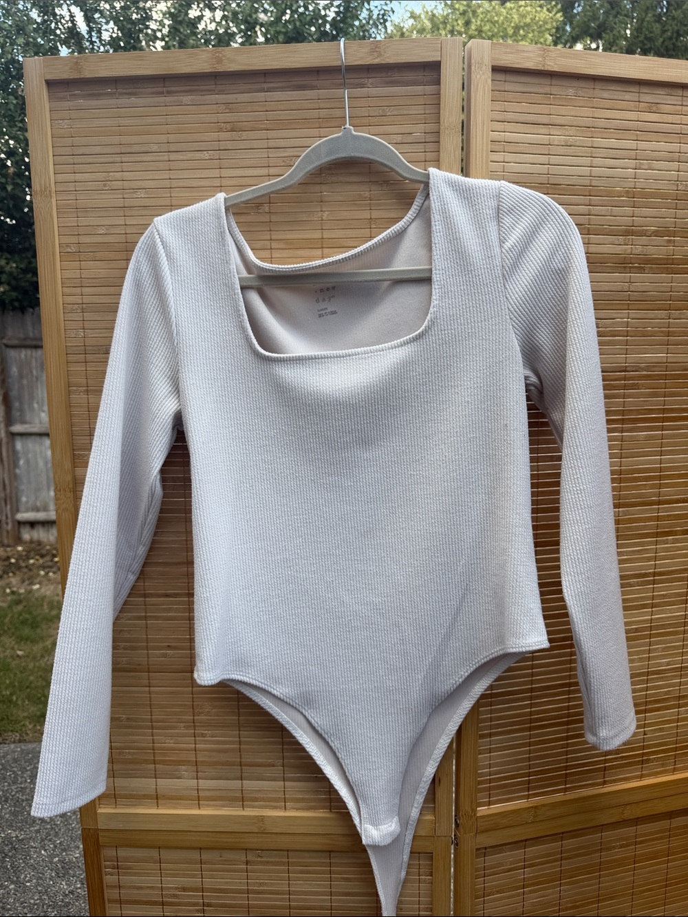 Long-Sleeve One-Piece Bodysuit in Light Beige